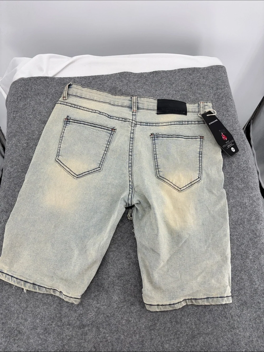 PIONEER Light Wash Distressed Denim Shorts with Black & Yellow Patches 34 NWT